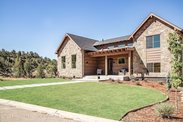 view of front of property with a front lawn