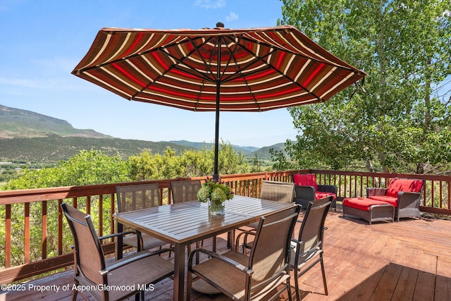 1436 Hooks Spur Rd, Basalt, CO 81621 - wooden terrace featuring a mountain view and outdoor dining space