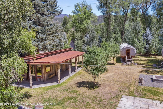 view of yard with a deck