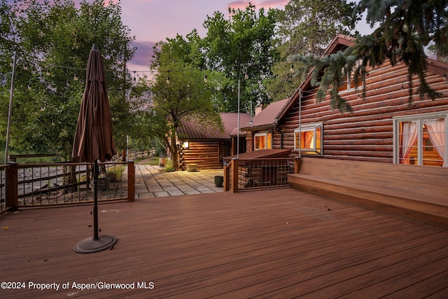 view of deck at dusk