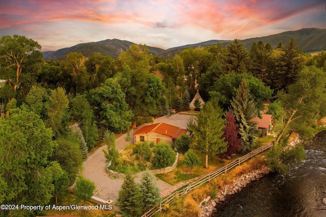 aerial view at dusk with a mountain view