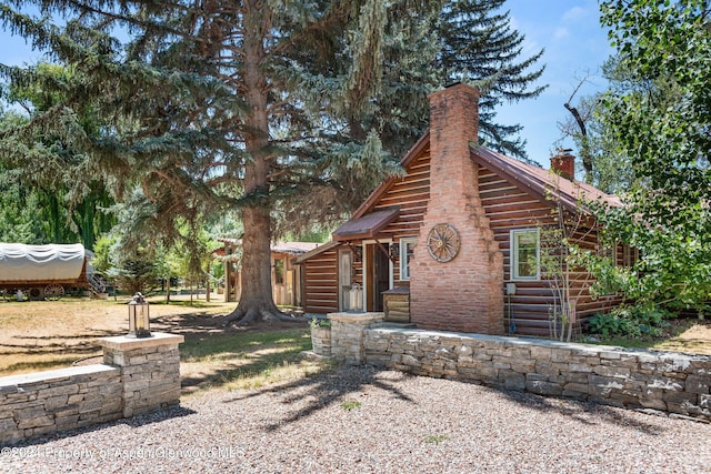 view of log cabin