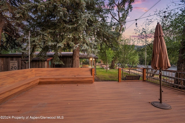 view of deck at dusk