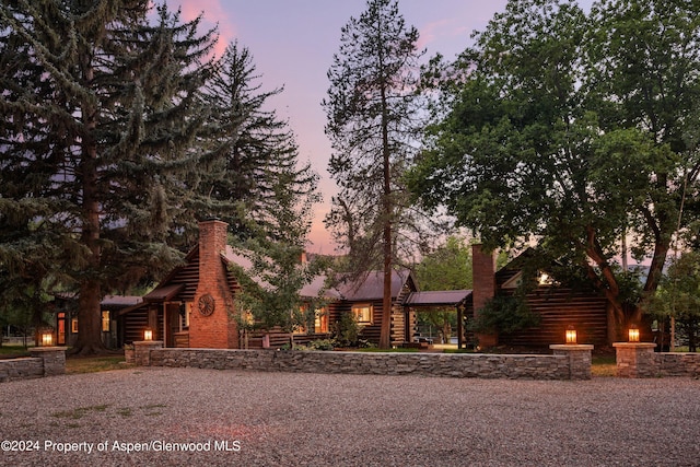 view of log cabin