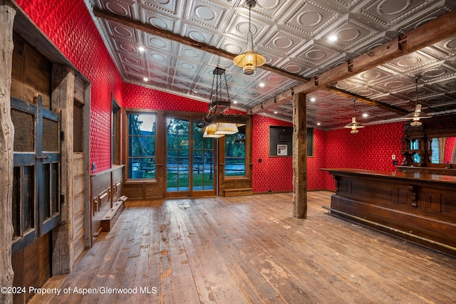 interior space featuring wood-type flooring and french doors