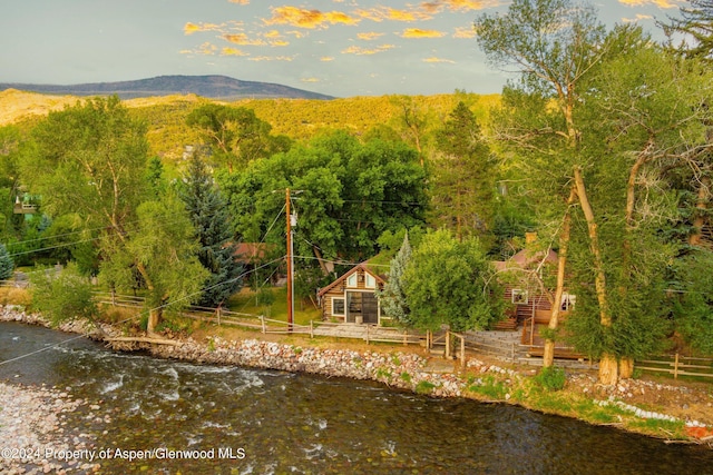 property view of mountains featuring a water view