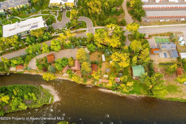 bird's eye view with a water view