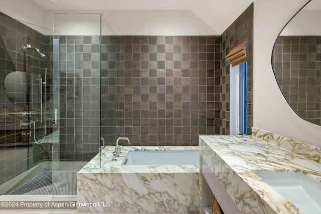 bathroom featuring shower with separate bathtub and vanity