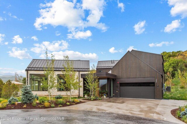 contemporary home featuring a garage