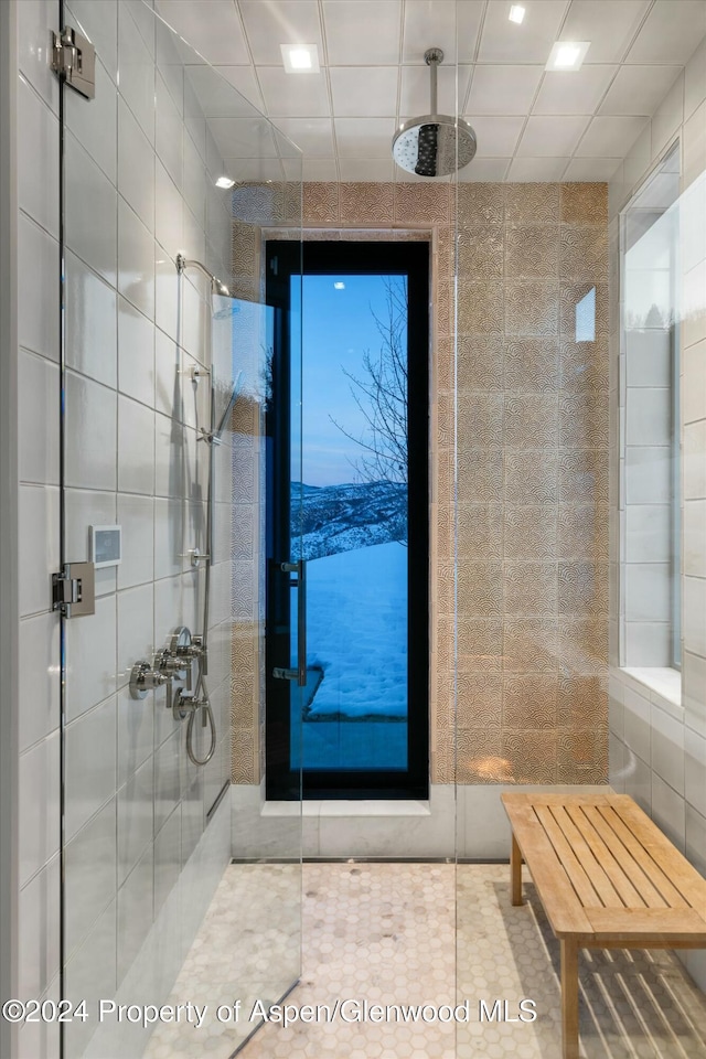 bathroom featuring tiled shower