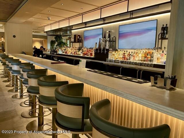 bar featuring wooden ceiling