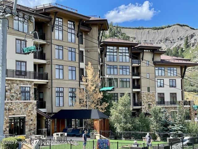 view of building exterior featuring a mountain view