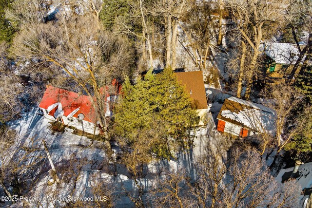 view of snow covered garage