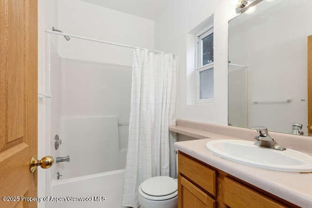 1608 Crawford Way, Glenwood Springs, CO 81601 - bathroom with vanity, toilet, and shower / bath combo with shower curtain