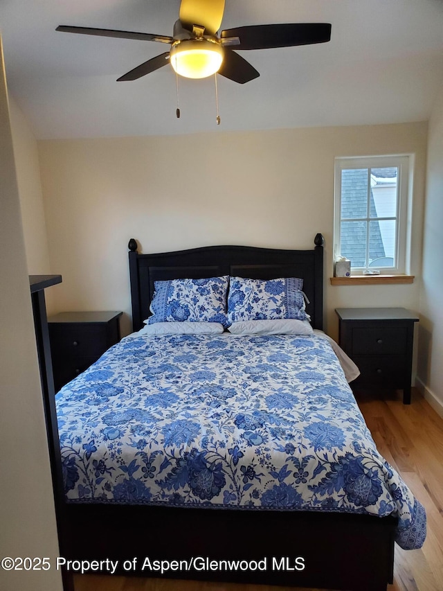 1608 Crawford Way, Glenwood Springs, CO 81601 - bedroom with light wood-type flooring and ceiling fan