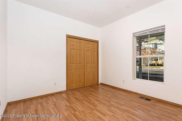1608 Crawford Way, Glenwood Springs, CO 81601 - unfurnished room with light wood-type flooring and baseboards