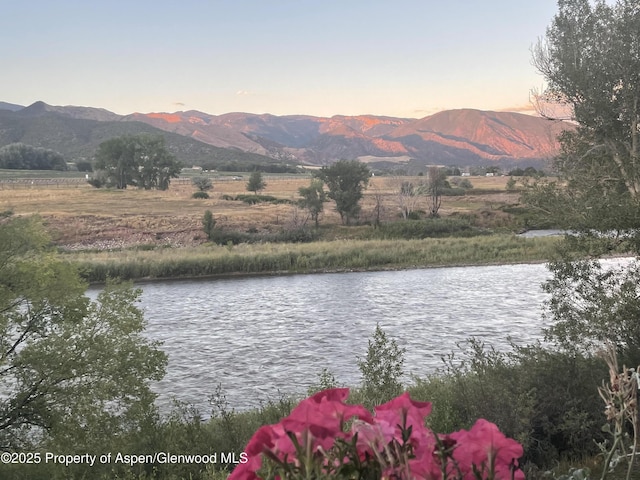 property view of water featuring a mountain view