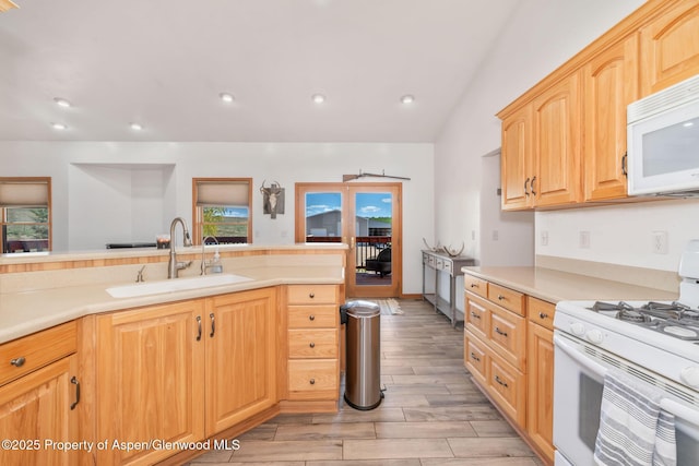 1600 County Road 30, Craig, CO 81625 - kitchen with white appliances, a sink, light wood-style flooring, light countertops, and recessed lighting