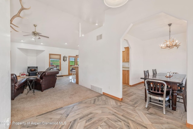 1600 County Road 30, Craig, CO 81625 - dining space with a chandelier, a ceiling fan, arched walkways, recessed lighting, and baseboards