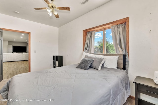 1600 County Road 30, Craig, CO 81625 - bedroom featuring wood finished floors, recessed lighting, and a ceiling fan