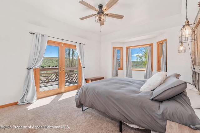 1600 County Road 30, Craig, CO 81625 - bedroom featuring access to outside, french doors, carpet, baseboards, and ceiling fan