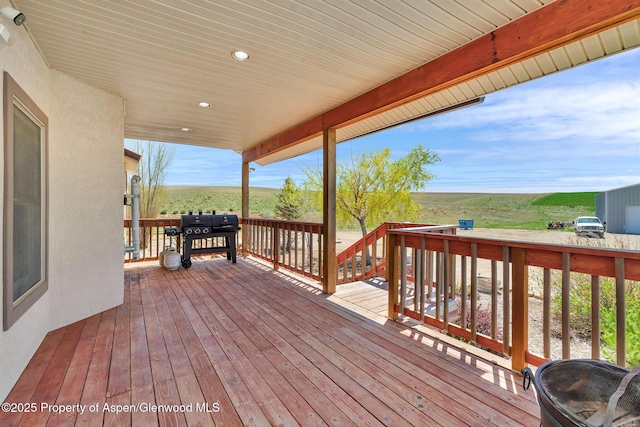 1600 County Road 30, Craig, CO 81625 - deck with a grill and a rural view