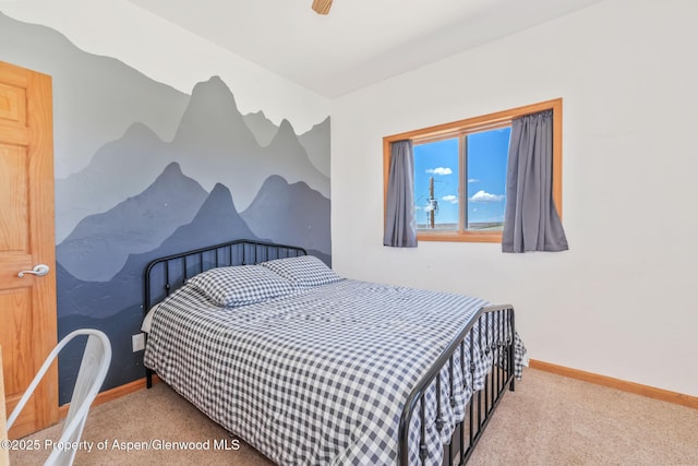 1600 County Road 30, Craig, CO 81625 - carpeted bedroom featuring baseboards and a ceiling fan