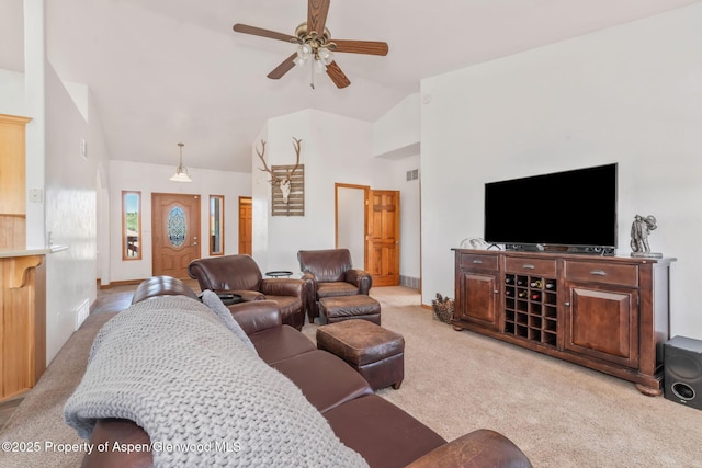 1600 County Road 30, Craig, CO 81625 - carpeted living room with high vaulted ceiling and a ceiling fan