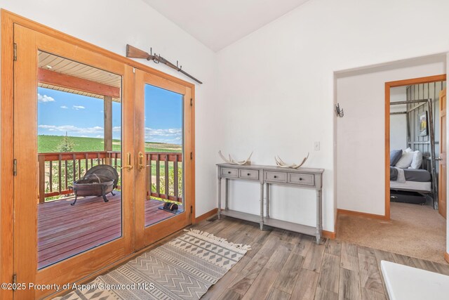 1600 County Road 30, Craig, CO 81625 - entryway with french doors, wood finished floors, and baseboards