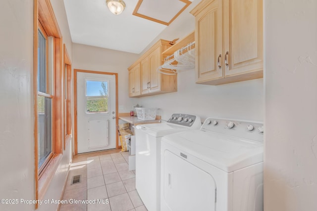 1600 County Road 30, Craig, CO 81625 - washroom with washer and clothes dryer, cabinet space, and light tile patterned flooring