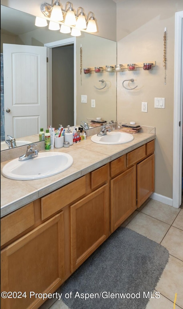 bathroom featuring tile patterned floors and vanity