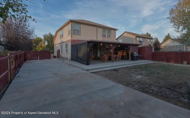 back of property with a patio area