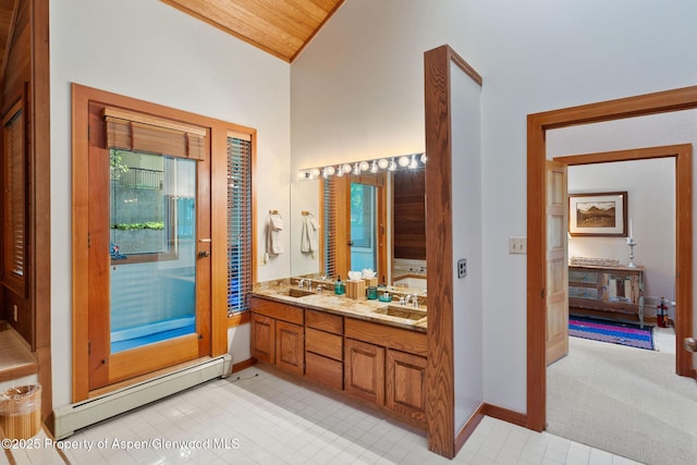 bathroom with vanity, wood ceiling, and baseboard heating