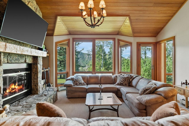 living room featuring vaulted ceiling, a fireplace, a baseboard radiator, wood ceiling, and an inviting chandelier