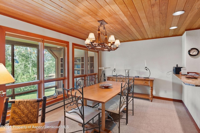 carpeted dining room featuring an inviting chandelier, a baseboard heating unit, and wood ceiling