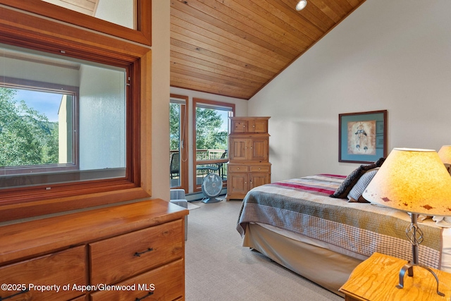 bedroom with lofted ceiling, carpet, and wooden ceiling