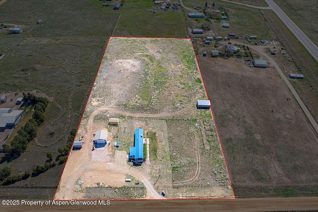 aerial view of property's location featuring property parcel outlined