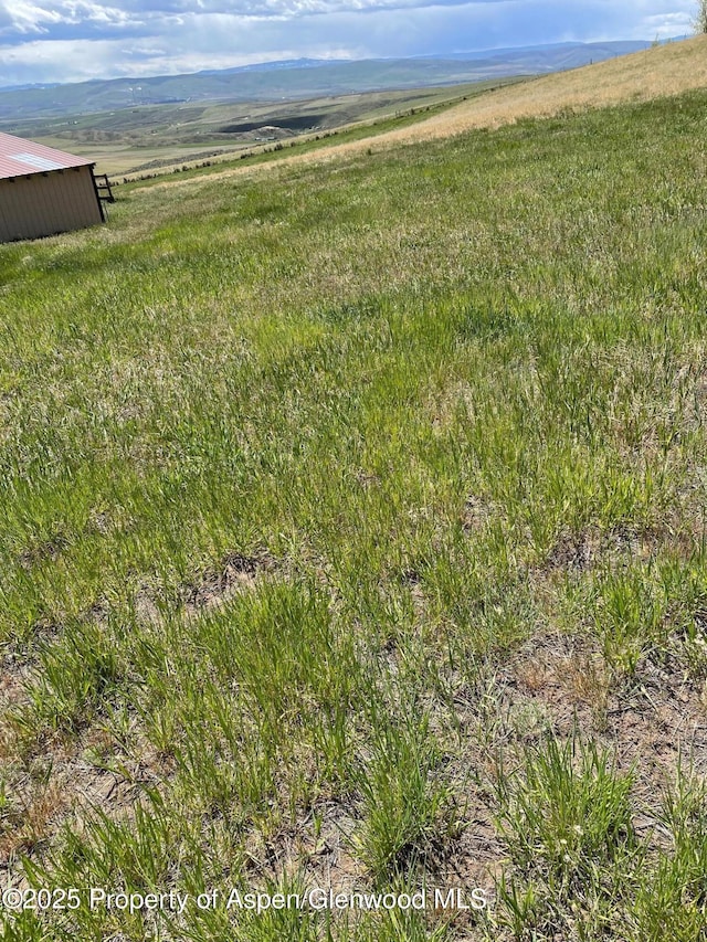 620 Ponderosa Pass, Craig, CO 81625 - view of mountain backdrop featuring rural landscape