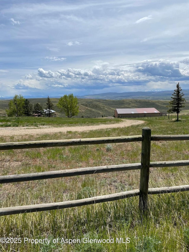620 Ponderosa Pass, Craig, CO 81625 - view of mountain backdrop featuring rural landscape and a pastoral area