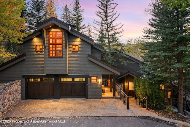 view of front of property with a garage