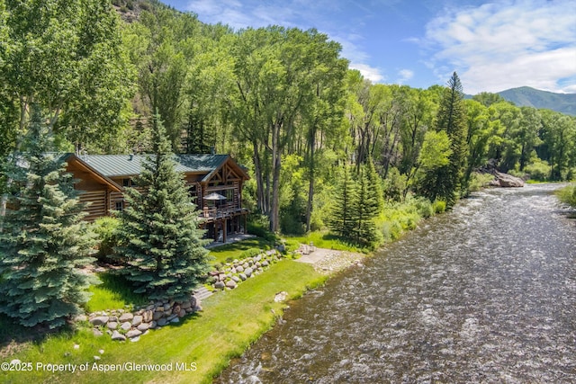 408 Gerbaz Way, Snowmass, CO 81654 - aerial view of property and surrounding area featuring a forest and a mountainous background