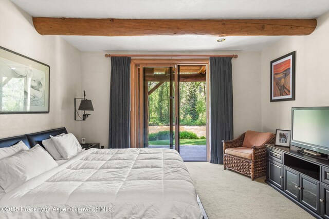 408 Gerbaz Way, Snowmass, CO 81654 - carpeted bedroom with beam ceiling and access to outside