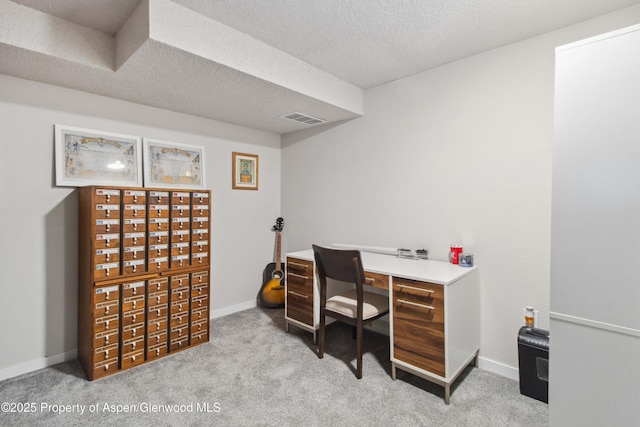 10 Spruce Ct, Parachute, CO 81635 - carpeted home office featuring a textured ceiling and baseboards
