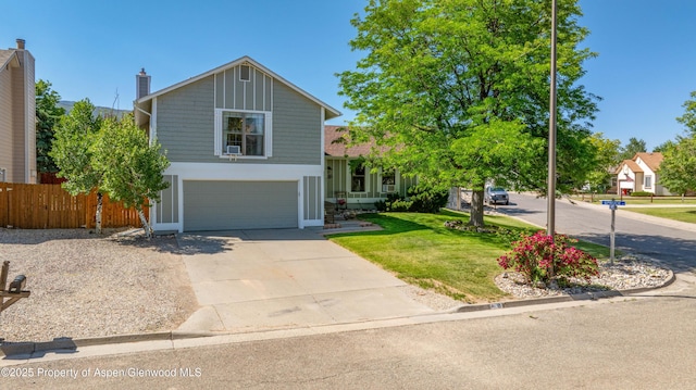 10 Spruce Ct, Parachute, CO 81635 - view of front facade with a garage and driveway