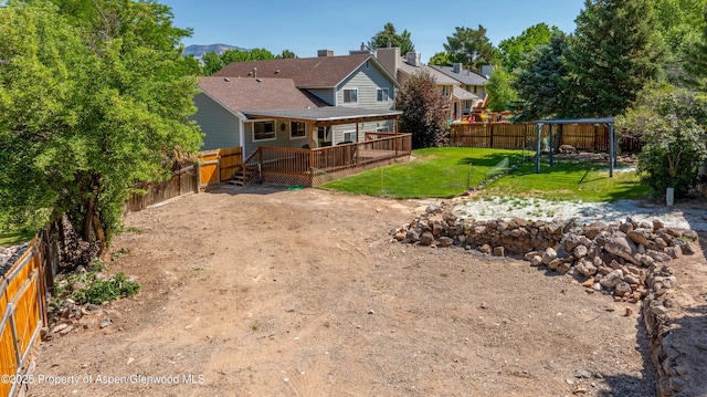10 Spruce Ct, Parachute, CO 81635 - rear view of house featuring a deck and a fenced backyard