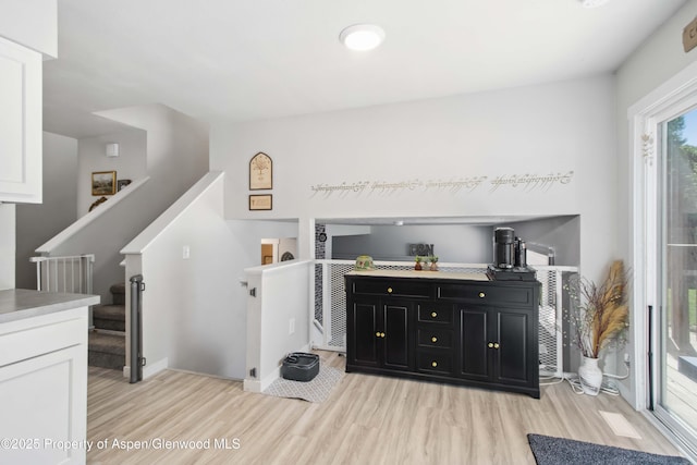 10 Spruce Ct, Parachute, CO 81635 - living area featuring light wood-type flooring and stairs