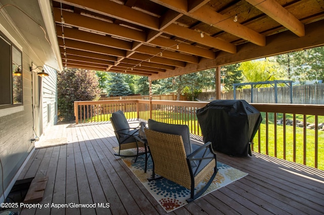 10 Spruce Ct, Parachute, CO 81635 - wooden terrace with a fenced backyard and a grill
