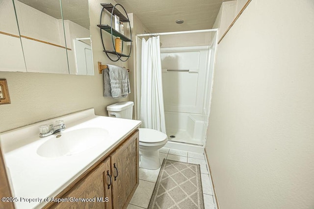 bathroom with tile patterned flooring, vanity, toilet, and a shower with shower curtain