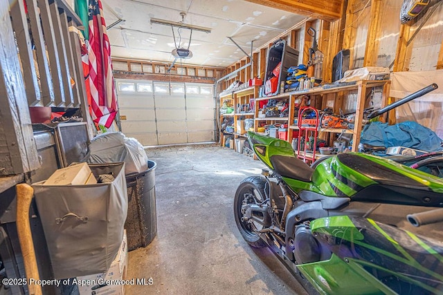 garage featuring a garage door opener