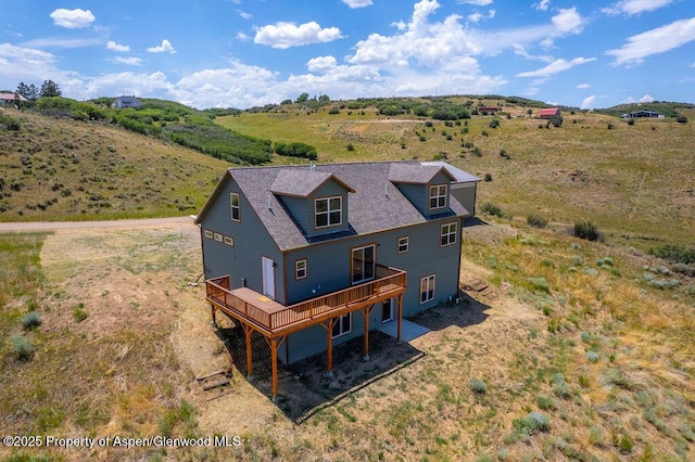 118 Highland Dr, Craig, CO 81625 - back of property with a wooden deck and a view of rural / pastoral area